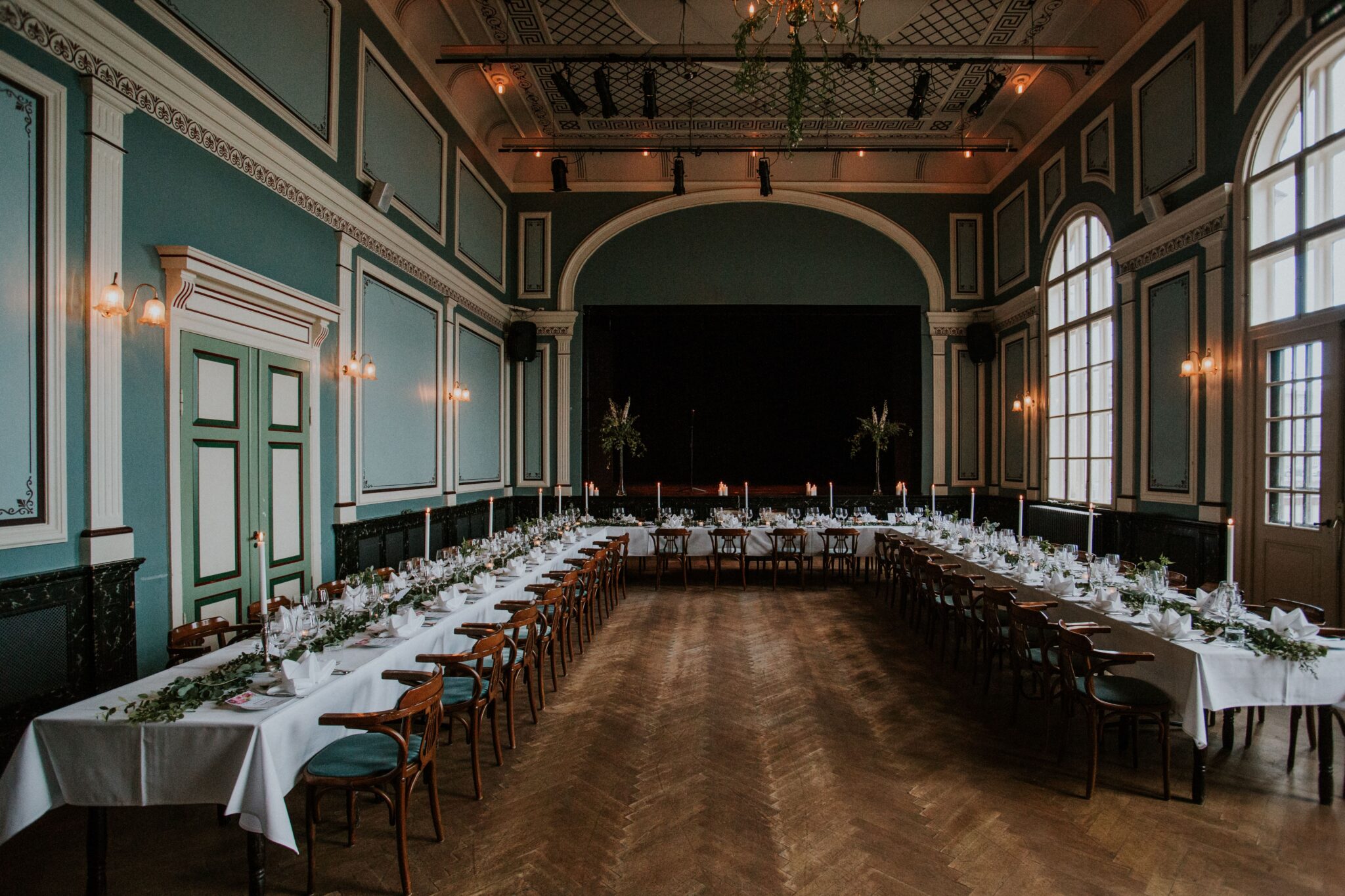 Vnv Events-Elegant ballroom with chandeliers and table settings for a Miami wedding