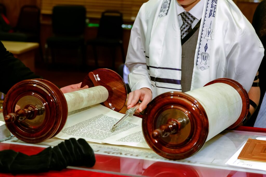 Jewish man dressed in ritual clothing family man mitzvah jerusalem