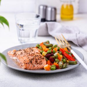 Baked salmon with boiled vegetable