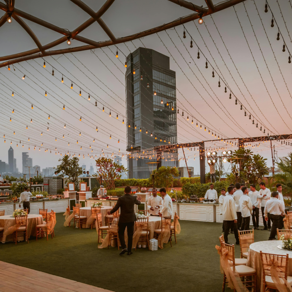 vnv events: Wedding decor ideas in Florida – “young smiling florist showing white floral decor to event manager with clipboard in event hall”-2 vnv events: Wedding decor ideas in Florida - "young smiling florist showing white floral decor to event manager with clipboard in event hall"-2