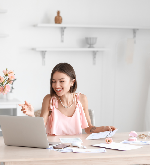 vnv events: destination planner-cover destination vnv events: Female Wedding Planner researching vendors in Office